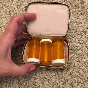 Coach pill case. Classic pattern.